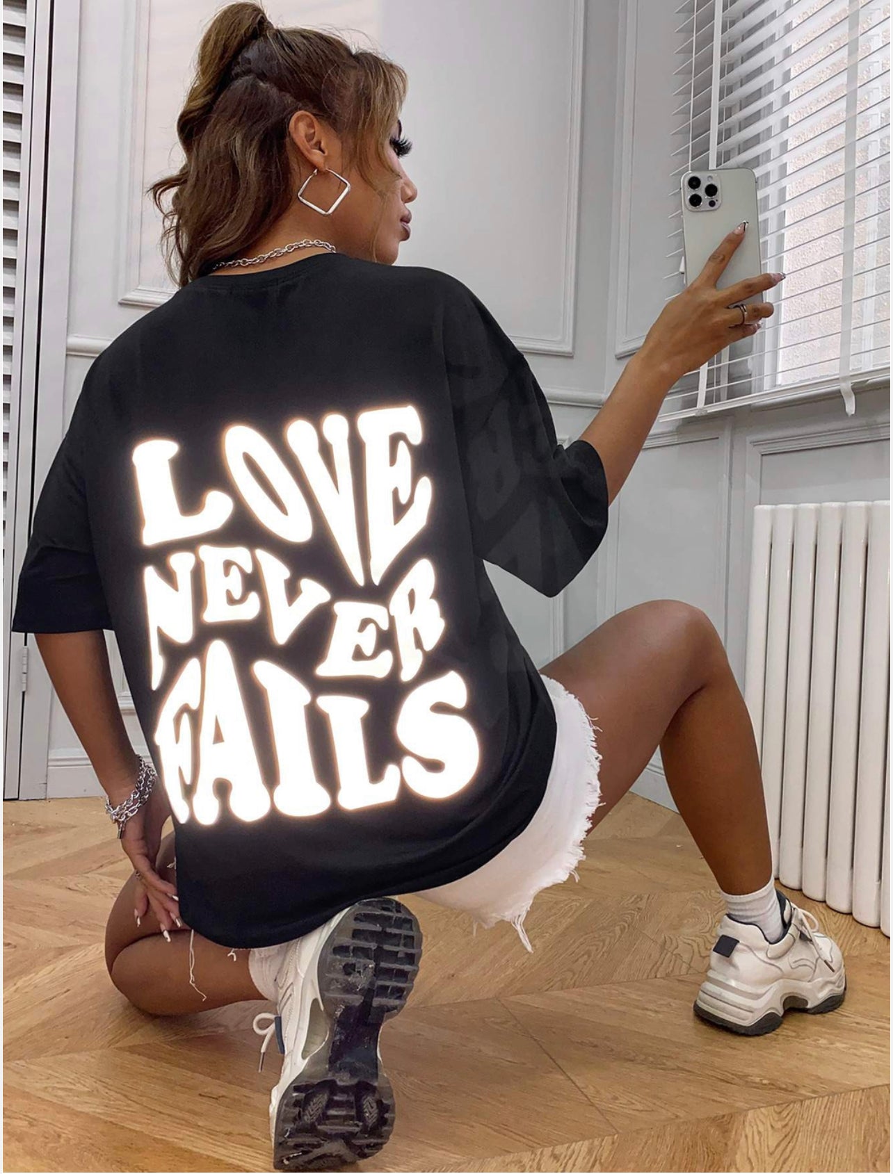 LOVE NEVER FAILS GRAPHIC TEE